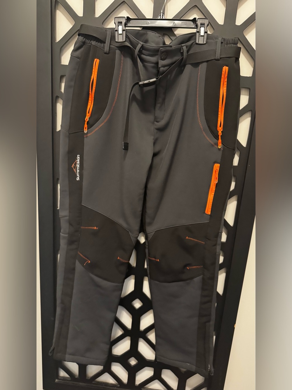 Bombshell Sportswear Black Summitskin ski pants with Orange Zippers